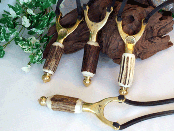 brass catapult with antler handle
